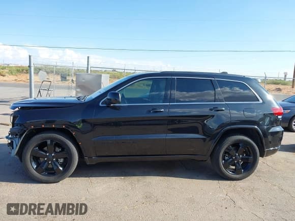 ✅ 2015 Jeep Grand Cherokee Laredo • VIN: 1C4RJEAG5FC125709 • Lot: 42608489. Listed on IAAI with 73,161 mi. Free auction sales archive from the USA and detailed vehicle history report at DreamBid. Image 14.