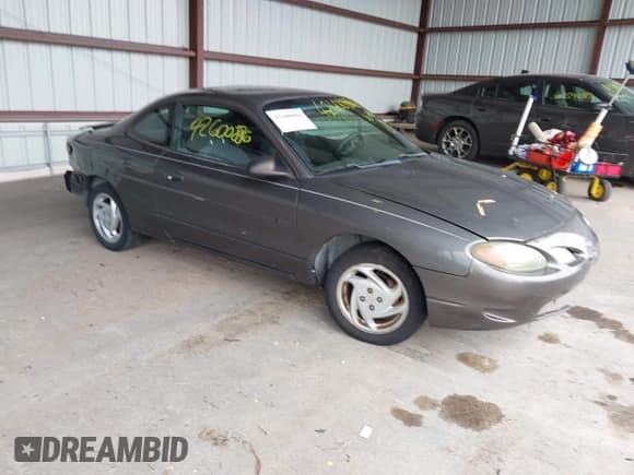 ✅ 2002 Ford Escort ZX2 Standard • VIN: 3FAFP11342R224496 • Lot: 42600886. Wystawiony na IAAI z przebiegiem 164 189 mil. Bezpłatny archiwum sprzedaży aukcyjnych z USA i szczegółowy raport historii pojazdu na DreamBid. Zdjęcie 1.