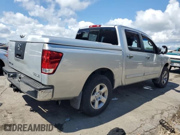 ✅ 2004 Nissan Titan LE • VIN: 1N6AA07A34N546992 • Lot: 65247535. Listed on Copart with 194,720 mi. Free auction sales archive from the USA and detailed vehicle history report at DreamBid. Image 3.