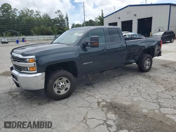 2017 Chevrolet Silverado 2500HD Work Truck with VIN 1GC2KUEG4HZ365658, listed as a Copart auction lot 68069045 with 233,573 mi miles and Salvage title. Bid and sale history available at DreamBid. Image 1.