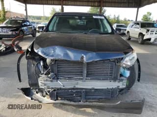 ✅ 2018 Chevrolet Traverse LS • VIN: 1GNERFKW2JJ207749 • Lot: 69281454. Wystawiony na Copart z przebiegiem 103 457 mil. Bezpłatny archiwum sprzedaży aukcyjnych z USA i szczegółowy raport historii pojazdu na DreamBid. Zdjęcie 5.