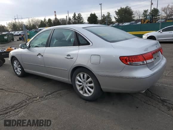 2006 Hyundai Azera SE z VIN KMHFC46F36A087430, wystawiony jako Copart lot #50927485 z przebiegiem 102 868 mil mil oraz Szkoda całkowita • Salvage title. Historia ofert i sprzedaży dostępna na DreamBid. Obrazek 2.