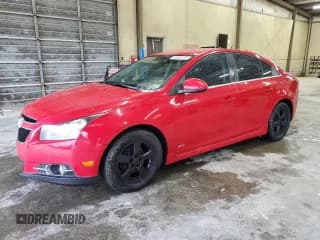 ✅ 2013 Chevrolet Cruze 1LT • VIN: 1G1PD5SB8D7184592 • Lot: 51816515. Listed on Copart with 118,304 mi. Free auction sales archive from the USA and detailed vehicle history report at DreamBid. Image 1.
