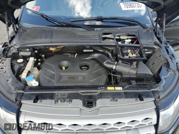 ✅ 2015 Land Rover Range Rover Evoque Pure Plus • VIN: SALVP2BGXFH015826 • Lot: 70980735. Wystawiony na Copart z przebiegiem 107 299 mil. Bezpłatny archiwum sprzedaży aukcyjnych z USA i szczegółowy raport historii pojazdu na DreamBid. Zdjęcie 12.