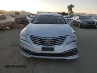 2016 Hyundai Azera z VIN KMHFG4JG4GA563397, wystawiony jako Copart lot #87879325 z przebiegiem 58 528 mil mil oraz Szkoda całkowita • Salvage title. Historia ofert i sprzedaży dostępna na DreamBid. Obrazek 5.