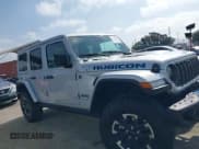 ✅ 2024 Jeep Wrangler Rubicon X • VIN: 1C4RJXR63RW145936 • Lot: 42562942. Listed on IAAI with 9,465 mi. Free auction sales archive from the USA and detailed vehicle history report at DreamBid. Image 13.