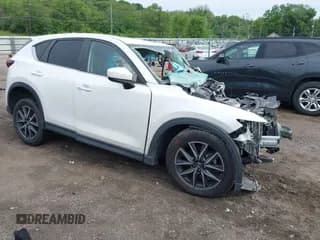 ✅ 2018 Mazda CX-5 Touring • VIN: JM3KFACM4J0321091 • Lot: 42378349. Wystawiony na IAAI z przebiegiem Nie podano. Bezpłatny archiwum sprzedaży aukcyjnych z USA i szczegółowy raport historii pojazdu na DreamBid. Zdjęcie 1.