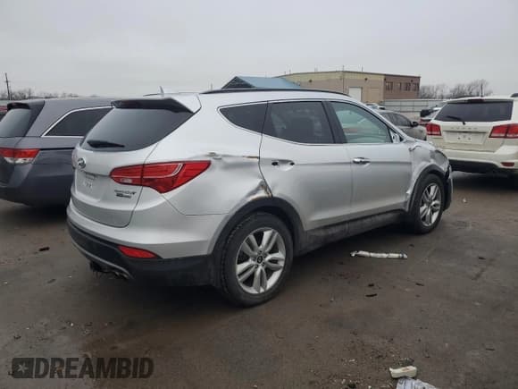 ✅ 2015 Hyundai Santa Fe • VIN: 5XYZWDLAXFG262726 • Лот: 40037664. Опубликован ранее на Copart с пробегом 100 572 миль. Бесплатный доступ к архиву аукционных продаж из США и подробный отчёт об истории автомобиля на DreamBid. Изображение 3.