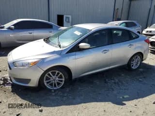 ✅ 2018 Ford Focus SE • VIN: 1FADP3F29JL242119 • Lot: 51519765. Listed on Copart with 99,750 mi. Free auction sales archive from the USA and detailed vehicle history report at DreamBid. Image 1.