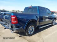 ✅ 2022 Ram 1500 Laramie • VIN: 1C6RREJTXNN291496 • Lot: 43663207. Listed on IAAI with 51,775 mi. Free auction sales archive from the USA and detailed vehicle history report at DreamBid. Image 4.