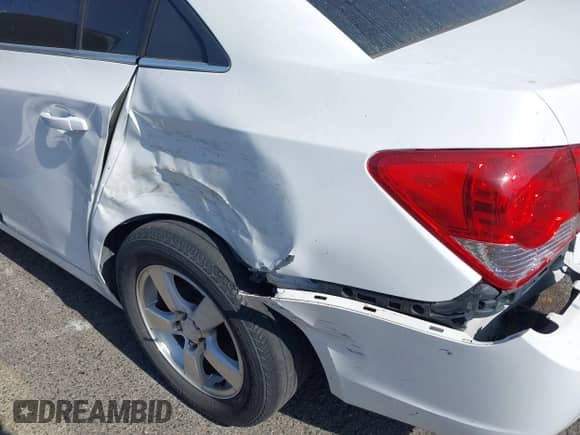 2012 Chevrolet Cruze 1FL z VIN 1G1PE5SC9C7231004, wystawiony jako IAAI lot #42572353 z przebiegiem 124 344 mil mil oraz . Historia ofert i sprzedaży dostępna na DreamBid. Obrazek 12.