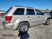 ✅ 2009 Jeep Grand Cherokee • VIN: 1J8HR68T69C520847 • Lot: 89548155. Listed on Copart with 322,340 mi. Free auction sales archive from the USA and detailed vehicle history report at DreamBid. Image 3.