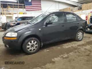 2005 Chevrolet Aveo LT z VIN KL1TG526X5B446845, wystawiony jako Copart lot #81936214 z przebiegiem 145 600 mil mil oraz Nie do naprawy • Non repairable. Historia ofert i sprzedaży dostępna na DreamBid. Obrazek 1.