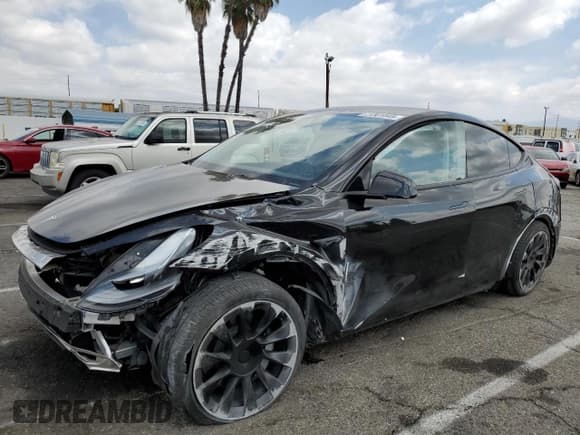 ✅ 2023 Tesla Model Y • VIN: 7SAYGDED1PF941165 • Lot: 71301845. Listed on Copart with 18,142 mi. Free auction sales archive from the USA and detailed vehicle history report at DreamBid. Image 1.