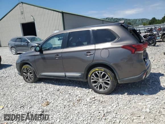 2018 Mitsubishi Outlander ES with VIN JA4AZ3A39JZ027175, listed as a Copart auction lot 70573725 with 197,576 mi miles and Salvage title. Bid and sale history available at DreamBid. Image 2.