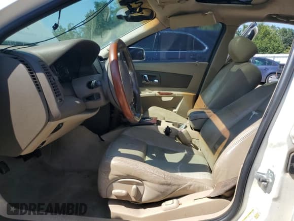 ✅ 2006 Cadillac CTS • VIN: 1G6DP577660159856 • Lot: 70337265. Wystawiony na Copart z przebiegiem Nie podano. Bezpłatny archiwum sprzedaży aukcyjnych z USA i szczegółowy raport historii pojazdu na DreamBid. Zdjęcie 7.