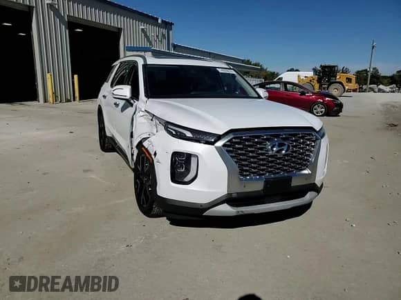 2020 Hyundai Palisade SEL с VIN KM8R4DHE1LU088388, выставлен на аукционе Copart как лот 74095624 с пробегом 105 906 миль миль и Списание • Salvage title. История ставок и продаж доступна на DreamBid. Изображение 14.