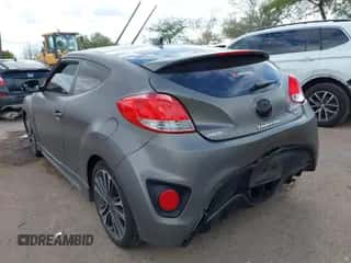 2014 Hyundai Veloster Turbo with VIN KMHTC6AE0EU184269, listed as a IAAI auction lot 43241844 with 60,668 mi miles and . Bid and sale history available at DreamBid. Image 6.