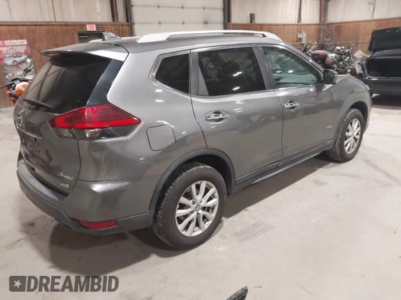 ✅ 2017 Nissan Rogue SV Hybrid • VIN: 5N1ET2MVXHC829856 • Lot: 43563787. Listed on IAAI with 126,640 mi. Free auction sales archive from the USA and detailed vehicle history report at DreamBid. Image 4.