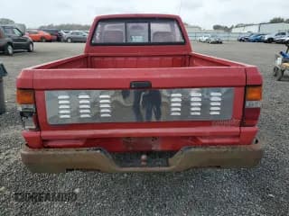 ✅ 1991 Mitsubishi Mighty Max • VIN: JA7FL24W2MP026041 • Lot: 79159244. Wystawiony na Copart z przebiegiem 219 903 mil. Bezpłatny archiwum sprzedaży aukcyjnych z USA i szczegółowy raport historii pojazdu na DreamBid. Zdjęcie 6.