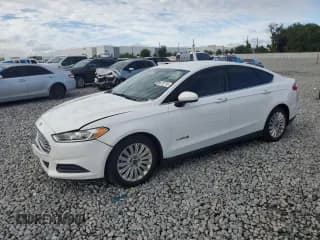 ✅ 2016 Ford Fusion S Hybrid • VIN: 3FA6P0UU8GR337602 • Lot: 85675715. Wystawiony na Copart z przebiegiem 166 957 mil. Bezpłatny archiwum sprzedaży aukcyjnych z USA i szczegółowy raport historii pojazdu na DreamBid. Zdjęcie 1.