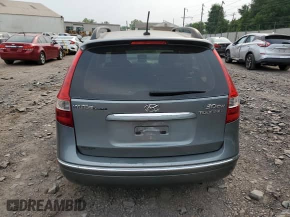 2010 Hyundai Elantra SE z VIN KMHDC8AE6AU059612, wystawiony jako Copart lot #67145645 z przebiegiem 162 561 mil mil oraz Szkoda całkowita • Salvage title. Historia ofert i sprzedaży dostępna na DreamBid. Obrazek 6.