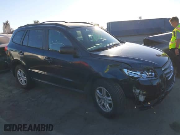 2012 Hyundai Santa Fe GLS z VIN 5XYZGDAB0CG096351, wystawiony jako IAAI lot #43476849 z przebiegiem 96 793 mil mil oraz . Historia ofert i sprzedaży dostępna na DreamBid. Obrazek 1.