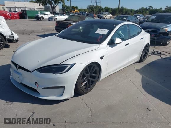 ✅ 2023 Tesla Model S • VIN: 5YJSA1E57PF501270 • Lot: 42068893. Listed on IAAI with Not provided. Free auction sales archive from the USA and detailed vehicle history report at DreamBid. Image 2.