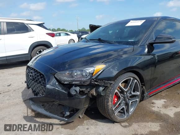 2020 Hyundai Veloster z VIN KMHT36AH9LU007422, wystawiony jako IAAI lot #42513370 z przebiegiem 102 805 mil mil oraz . Historia ofert i sprzedaży dostępna na DreamBid. Obrazek 6.