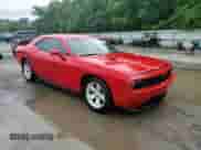 2014 Dodge Challenger SXT 100th Anniversary z VIN 2C3CDYAG1EH278828, wystawiony jako Copart lot #58417075 z przebiegiem 136 953 mil mil oraz Szkoda całkowita • Salvage title. Historia ofert i sprzedaży dostępna na DreamBid. Obrazek 13.