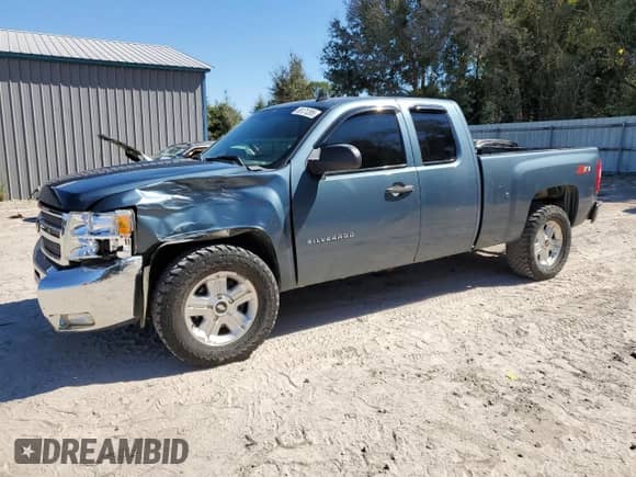 2012 Chevrolet Silverado 1500 LT with VIN 1GCRCSE02CZ148654, listed as a Copart auction lot 86171285 with 218,565 mi miles and Salvage title. Bid and sale history available at DreamBid. Image 1.
