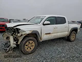 ✅ 2023 Toyota Tacoma TRD Off Road • VIN: 3TMCZ5AN0PM604214 • Lot: 94936725. Listed on Copart with 95,421 mi. Free auction sales archive from the USA and detailed vehicle history report at DreamBid. Image 1.