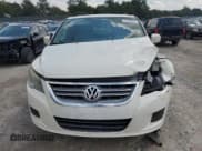 ✅ 2011 Volkswagen Routan SE • VIN: 2V4RW3DG0BR805140 • Lot: 71430375. Listed on Copart with 240,407 mi. Free auction sales archive from the USA and detailed vehicle history report at DreamBid. Image 5.