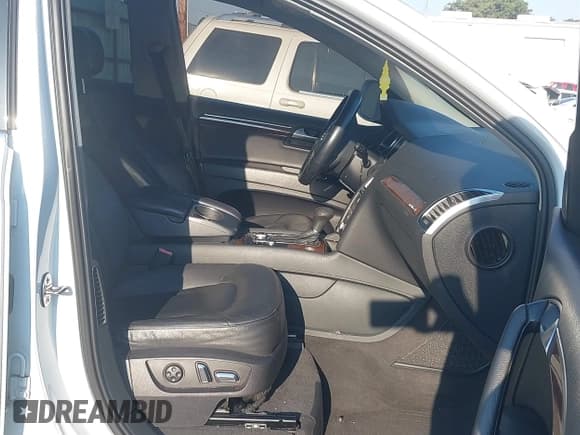 ✅ 2013 Audi Q7 Premium Plus • VIN: WA1LGAFE0DD005287 • Lot: 43192497. Listed on IAAI with 203,590 mi. Free auction sales archive from the USA and detailed vehicle history report at DreamBid. Image 5.