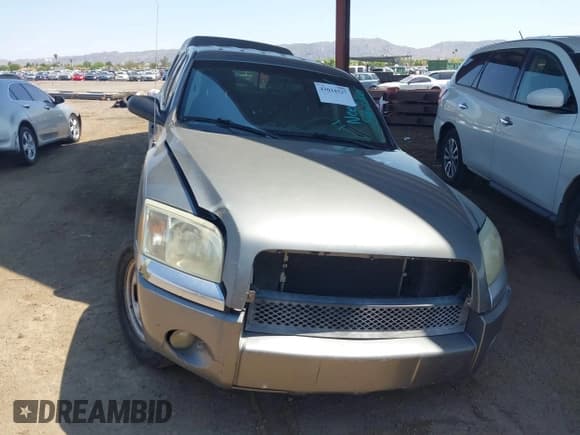 ✅ 2007 Mitsubishi Raider LS • VIN: 1Z7HC28K27S161514 • Lot: 43024327. Listed on IAAI with 301,467 mi. Free auction sales archive from the USA and detailed vehicle history report at DreamBid. Image 1.