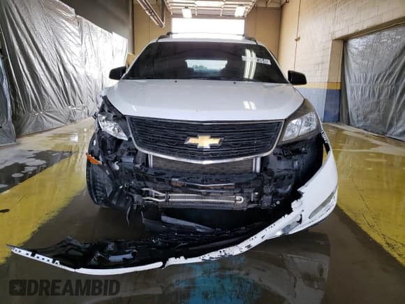 ✅ 2017 Chevrolet Traverse LS • VIN: 1GNKVFED6HJ221270 • Lot: 64547384. Wystawiony na Copart z przebiegiem Nie podano. Bezpłatny archiwum sprzedaży aukcyjnych z USA i szczegółowy raport historii pojazdu na DreamBid. Zdjęcie 5.