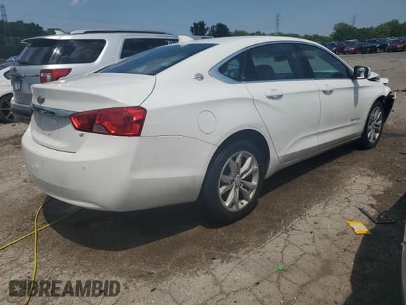 ✅ 2017 Chevrolet Impala LT • VIN: 2G1105SA2H9166571 • Лот: 62461354. Опубликован ранее на Copart с пробегом 99 571 миль. Бесплатный доступ к архиву аукционных продаж из США и подробный отчёт об истории автомобиля на DreamBid. Изображение 3.