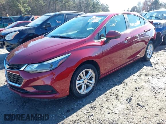 ✅ 2018 Chevrolet Cruze LT • VIN: 1G1BE5SM1J7213855 • Lot: 40998816. Listed on IAAI with 84,328 mi. Free auction sales archive from the USA and detailed vehicle history report at DreamBid. Image 18.