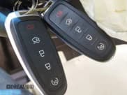 ✅ 2014 Lincoln MKS • VIN: 1LNHL9DK7EG609638 • Lot: 42522461. Wystawiony na IAAI z przebiegiem 48 785 mil. Bezpłatny archiwum sprzedaży aukcyjnych z USA i szczegółowy raport historii pojazdu na DreamBid. Zdjęcie 11.