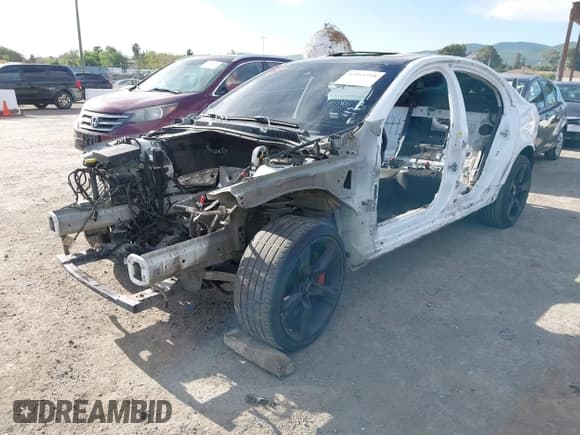 ✅ 2014 Chevrolet SS • VIN: 6G3F15RW6EL958354 • Lot: 42011918. Listed on IAAI with Not provided. Free auction sales archive from the USA and detailed vehicle history report at DreamBid. Image 2.