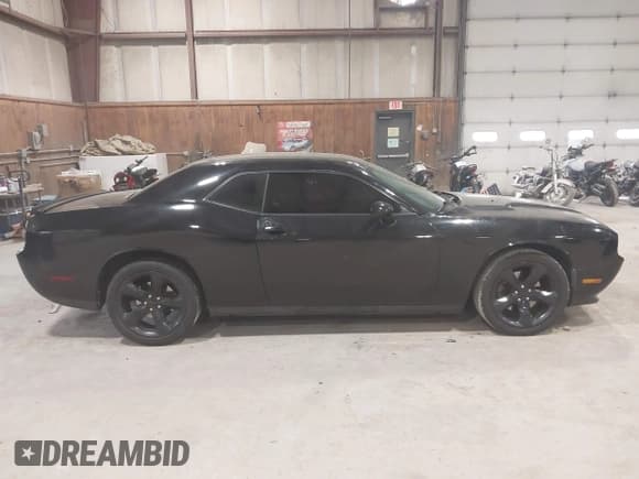 ✅ 2013 Dodge Challenger SXT • VIN: 2C3CDYAG6DH632762 • Lot: 42319731. Listed on IAAI with 140,667 mi. Free auction sales archive from the USA and detailed vehicle history report at DreamBid. Image 14.