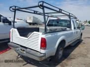 ✅ 1999 Ford F-250 XL • VIN: 1FTNX20F3XEB67936 • Lot: 42052426. Listed on IAAI with 216,245 mi. Free auction sales archive from the USA and detailed vehicle history report at DreamBid. Image 4.