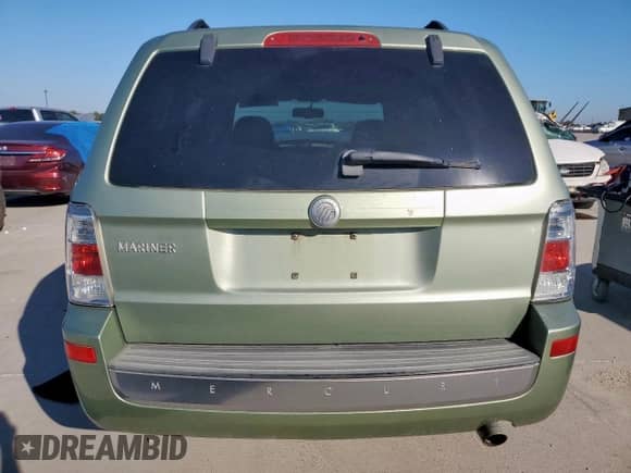 2009 Mercury Mariner с VIN 4M2CU81799KJ01514, выставлен на аукционе Copart как лот 82219345 с пробегом 392 707 миль миль и Списание • Salvage title. История ставок и продаж доступна на DreamBid. Изображение 6.