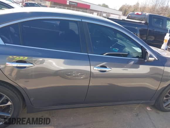 2012 Nissan Maxima S z VIN 1N4AA5APXCC821884, wystawiony jako IAAI lot #41640474 z przebiegiem 185 732 mil mil oraz . Historia ofert i sprzedaży dostępna na DreamBid. Obrazek 14.