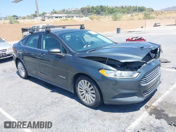 ✅ 2016 Ford Fusion S Hybrid • VIN: 3FA6P0UU2GR131952 • Lot: 42990600. Wystawiony na IAAI z przebiegiem 164 073 mil. Bezpłatny archiwum sprzedaży aukcyjnych z USA i szczegółowy raport historii pojazdu na DreamBid. Zdjęcie 1.