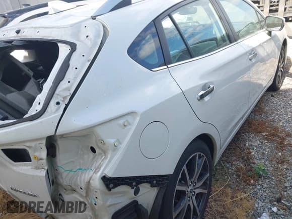 ✅ 2018 Subaru Impreza Limited • VIN: 4S3GTAU64J3752813 • Lot: 42986673. Listed on IAAI with 70,024 mi. Free auction sales archive from the USA and detailed vehicle history report at DreamBid. Image 4.