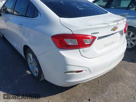 2016 Chevrolet Cruze LT with VIN 1G1BE5SM2G7271451, listed as a IAAI auction lot 43391114 with 228,784 mi miles and . Bid and sale history available at DreamBid. Image 14.