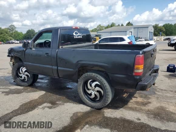2002 Chevrolet Silverado 1500 LS with VIN 1GCEK14T72Z106860, listed as a Copart auction lot 54909765 with 301,431 mi miles and Salvage title. Bid and sale history available at DreamBid. Image 2.