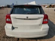 ✅ 2010 Dodge Caliber SXT • VIN: 1B3CB4HA9AD534279 • Лот: 72930874. Опубликован ранее на Copart с пробегом 204 836 миль. Бесплатный доступ к архиву аукционных продаж из США и подробный отчёт об истории автомобиля на DreamBid. Изображение 6.