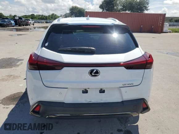 ✅ 2022 Lexus UX 200 F Sport • VIN: JTHE3JBH6N2055584 • Лот: 71727835. Опубликован ранее на Copart с пробегом 28 871 миль. Бесплатный доступ к архиву аукционных продаж из США и подробный отчёт об истории автомобиля на DreamBid. Изображение 6.
